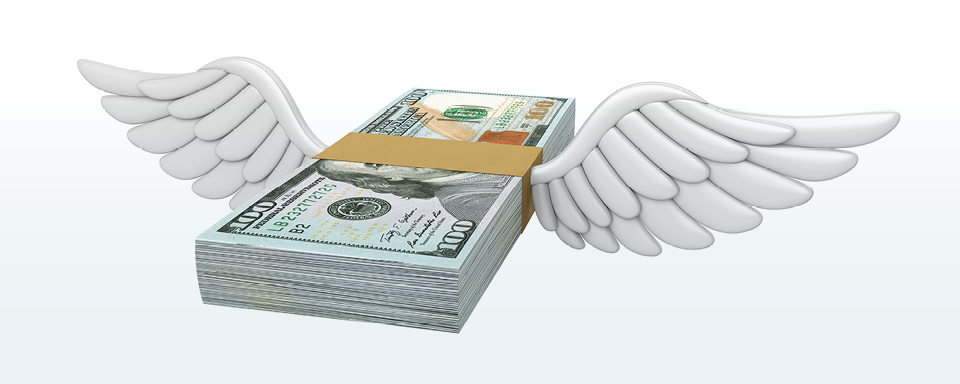 Dollar bills flying away