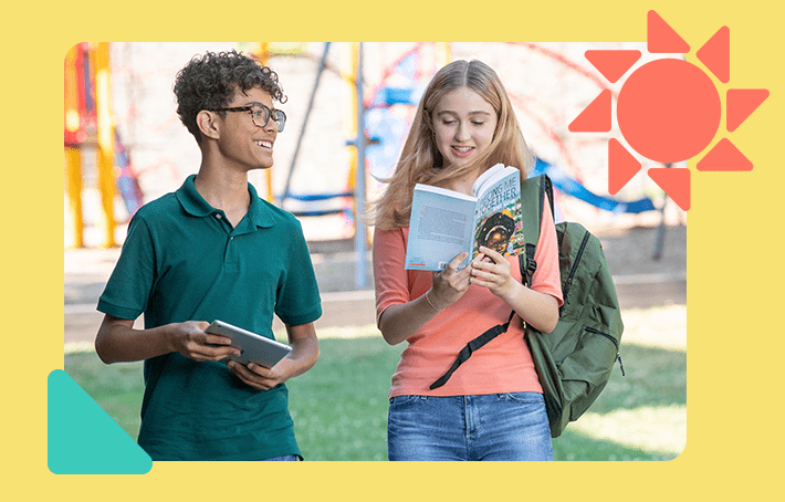 Middle-school students discussing a novel while walking.